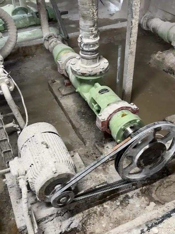 A freshly set pump running on its aligned belt drive